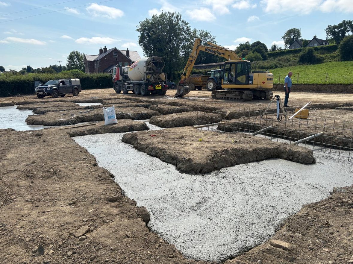 Concrete foundations being poured on site