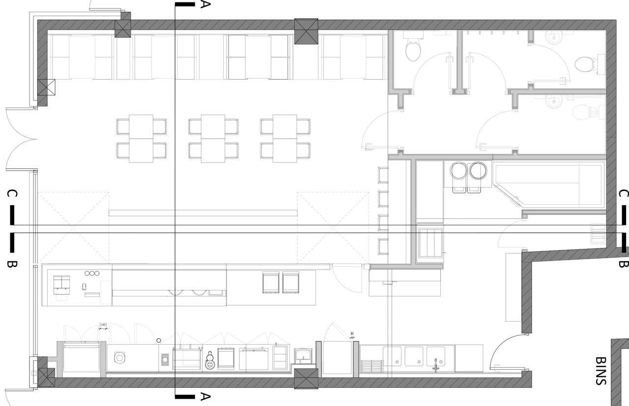 Restaurant floor plan showing counter, kitchen and seating layout